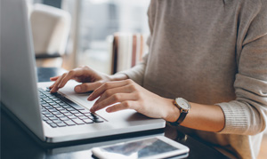 Woman at computer.