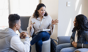 Counselor with students.